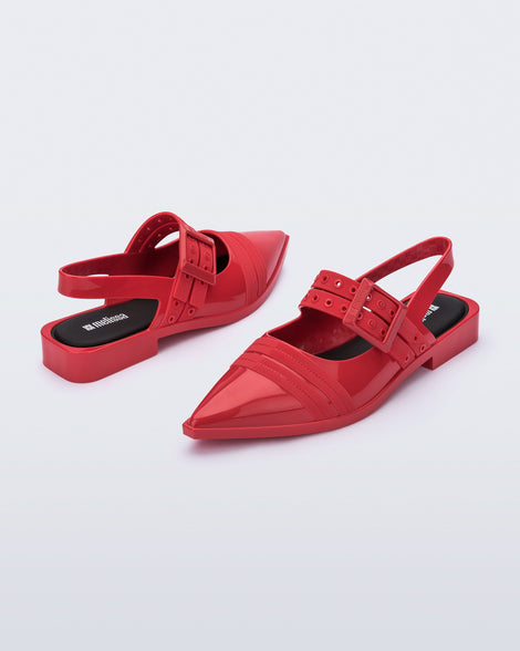 Angled view of a pair of red Ladylike flats