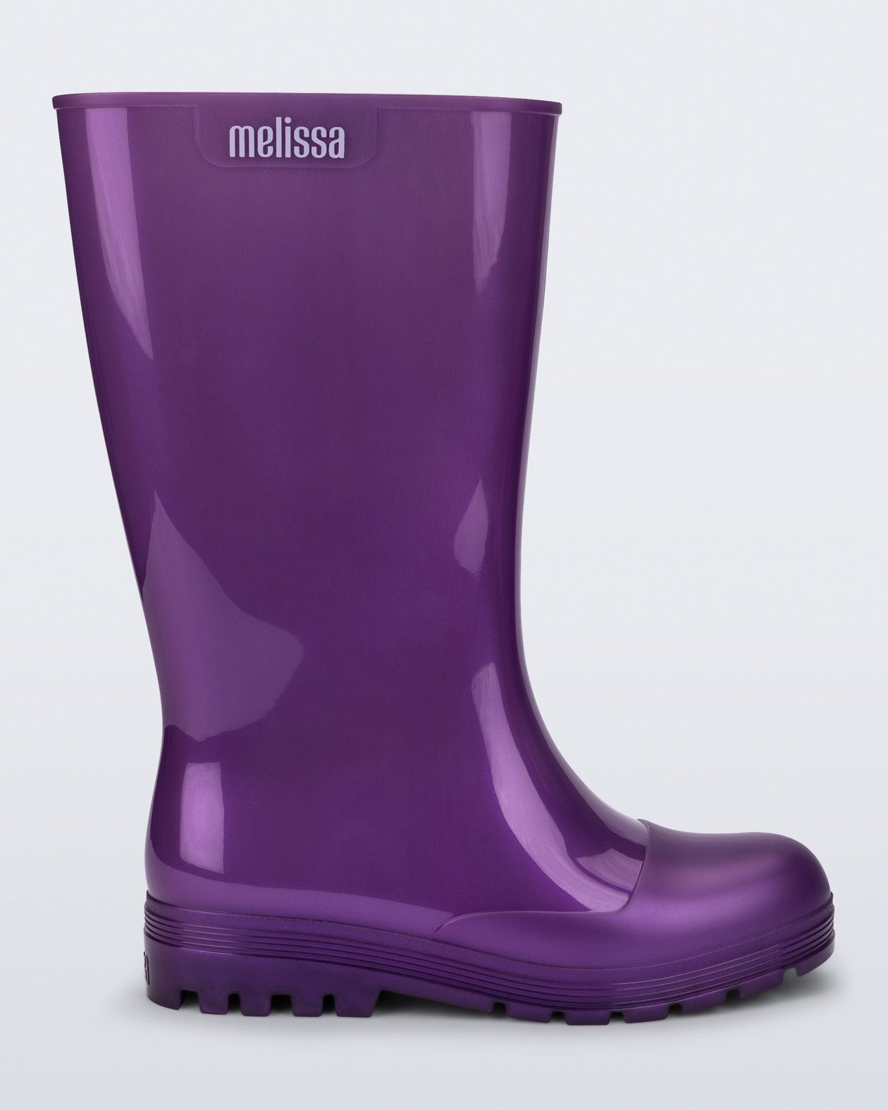 Side view of a purple Welly rainboot.