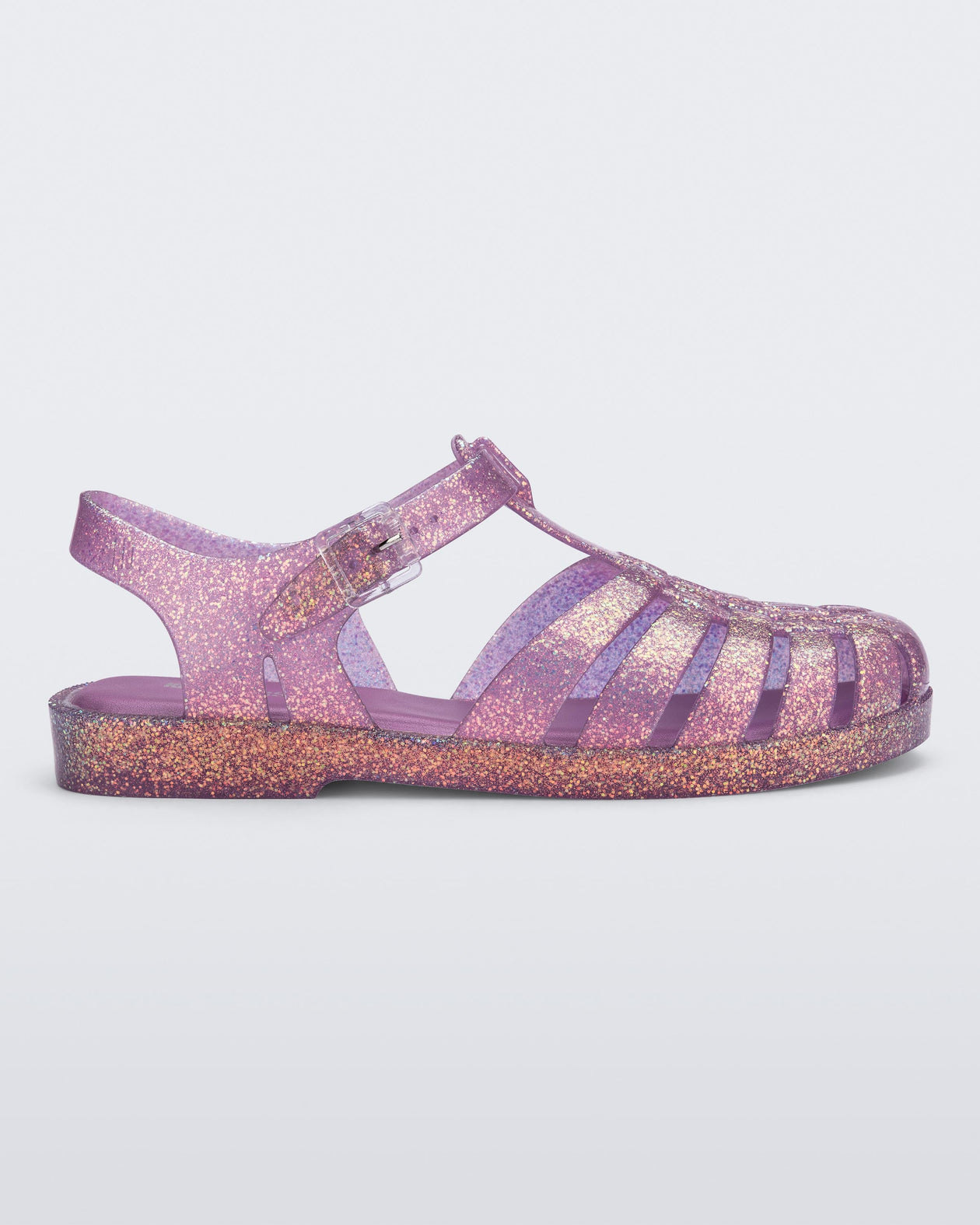 Side view of a glitter lilac Possession sandal