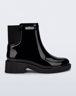 Side view of a black Chelsea Boot