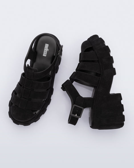 Top and side view of a pair of black Megan Velvet heel sandals.