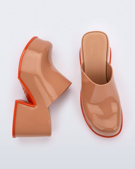 Top and side angled view of a pair of brown Mia Platform Mule Heels with orange sole