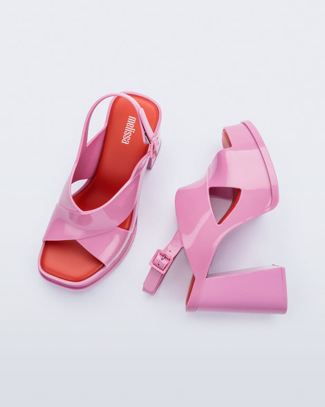 Top and side view of a pair of pink Dance Heel platforms