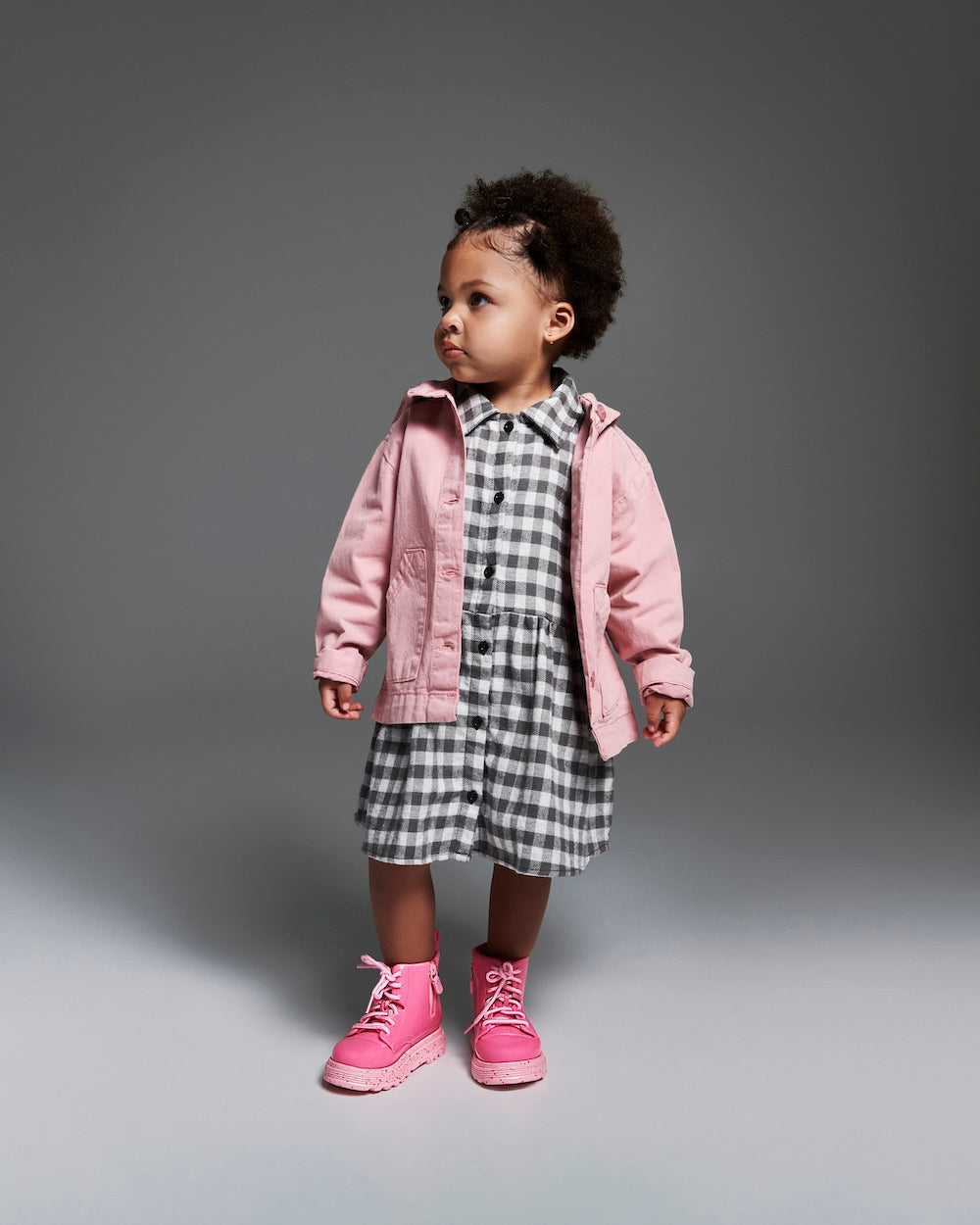 Baby model wearing the baby pink coturno boot