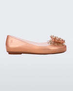 Side view of a gold Sweet Love Butterfly kids flats.