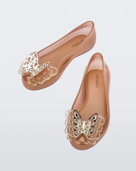 Top angled view of a pair of gold Sweet Love Butterfly kids flats.