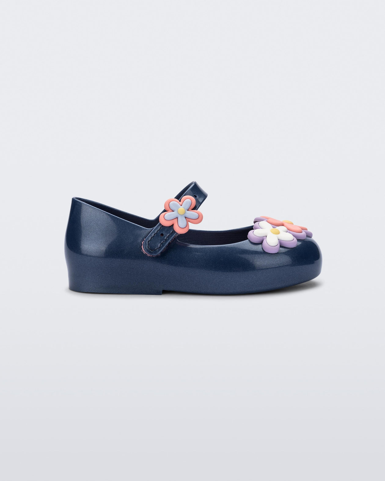 Side view of a metallic blue Sweet Love Picnic baby flats with flowers