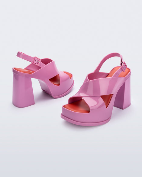 Angled view of a pair of pink Dance Heel platforms