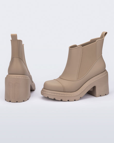 Back and side view of a pair of beige Courtney Boots