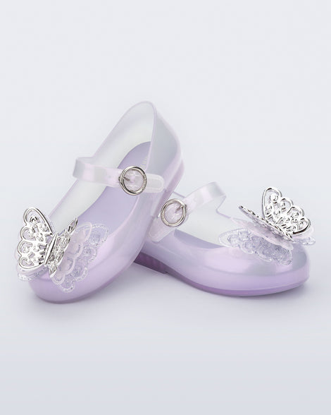 Angled view of a pair of pearly purple Sweet Love baby flats