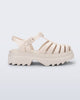 Side view of a beige Possession Platform II sandal.