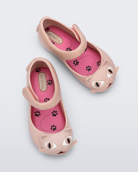 Top view of a pair of light pink baby Ultragirl Cat flats