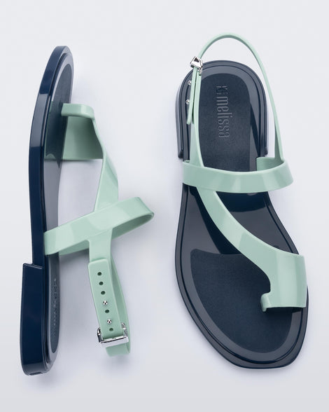 Top and side view of a pair of green Cassie sandals.