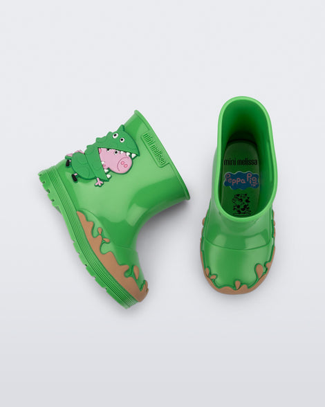 Side and top view of a pair of green Welly Peppa Pig rain boots