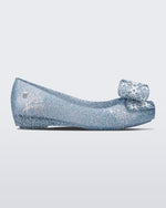 Side view of a blue/glitter kids Ultragirl Frozen flat.