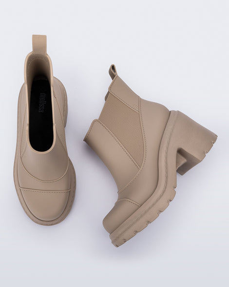 Top and side view of a pair of beige Courtney Boots