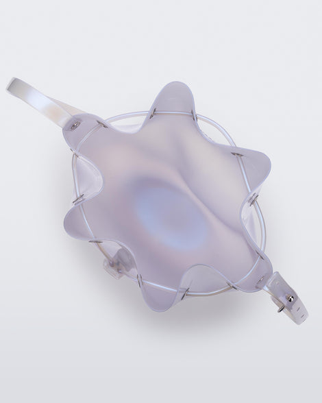 Top view of a pearly blue Sac drawstring bag.