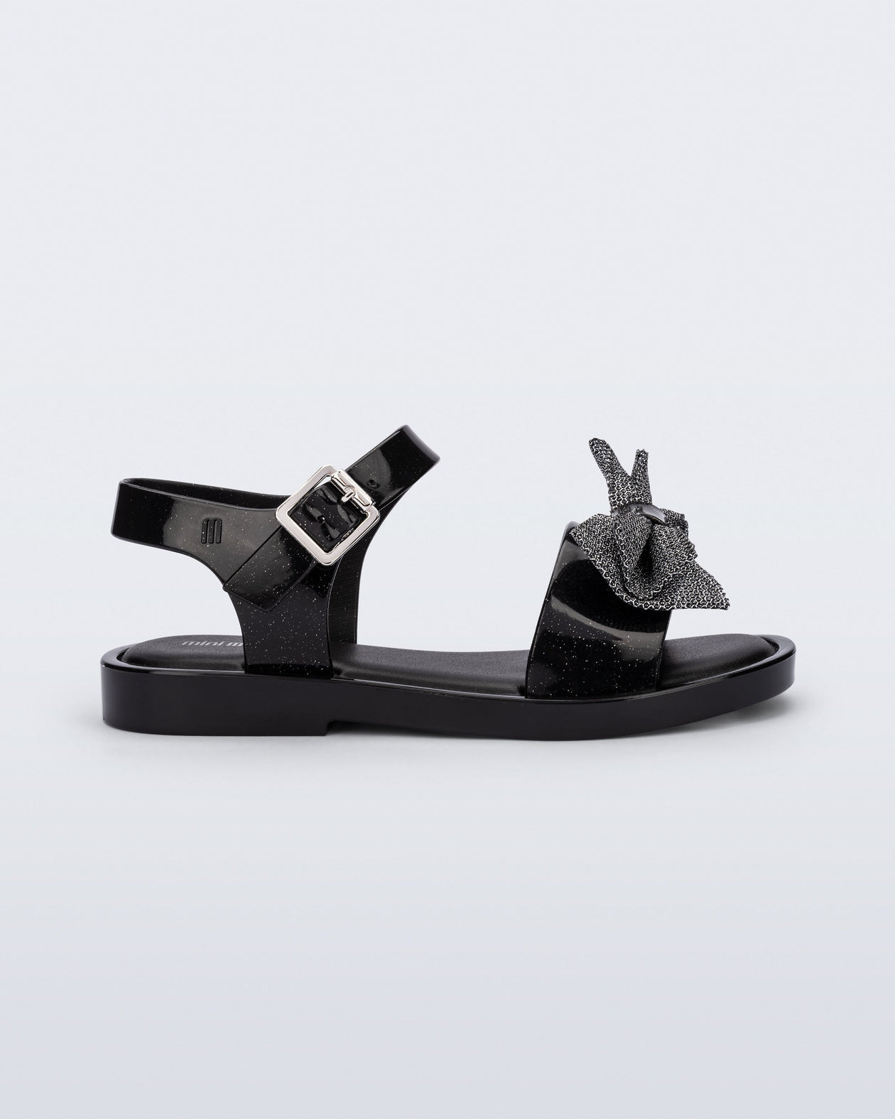 Side view of a  glitter black Mar Sweet kids sandal