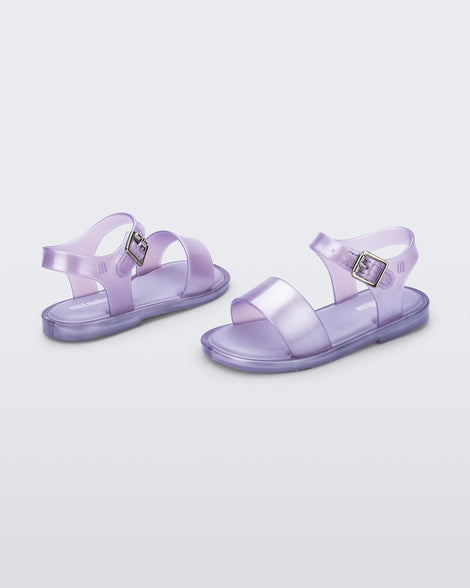 Angled view of a pair of pearly lilac baby Mar Sandals