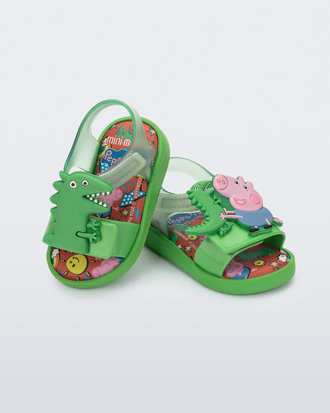 Angled view of a pair of green Jump + Peppa Pig baby sandals