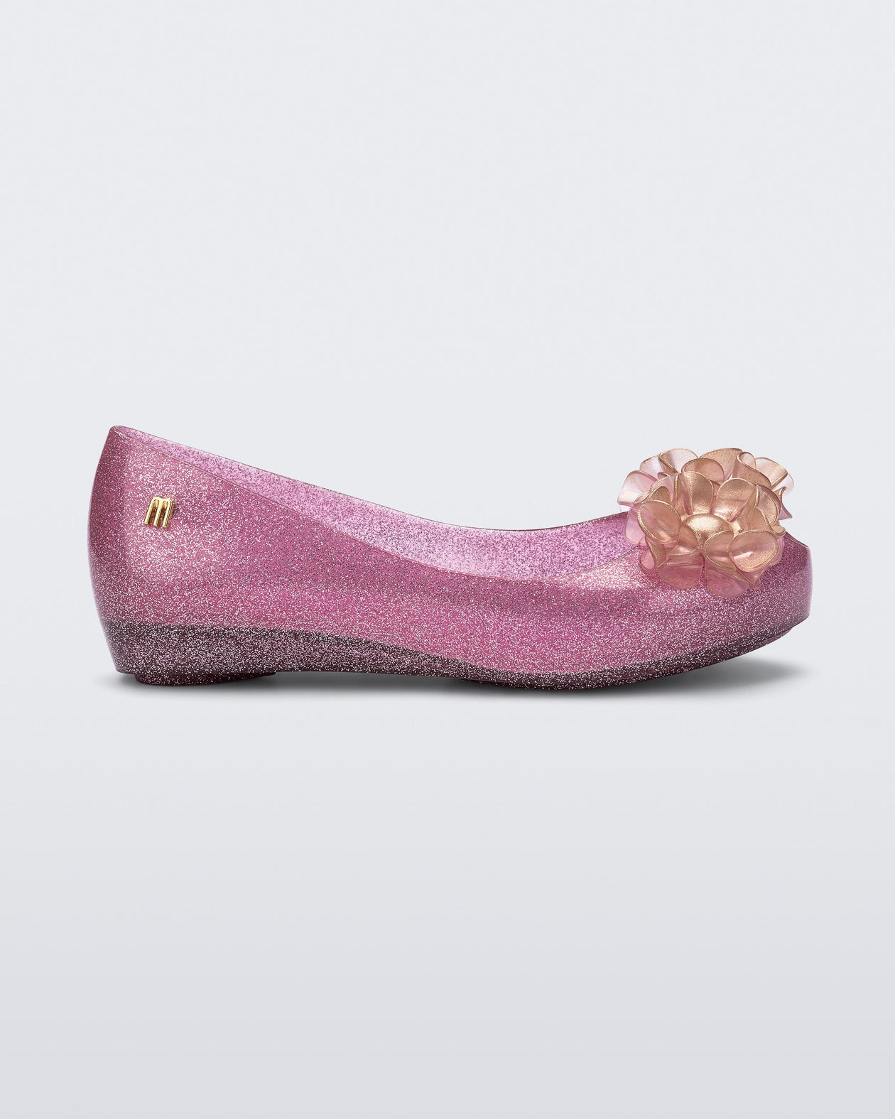 Side view of a glitter pink kids Ultragirl Springtime flats