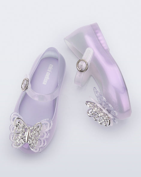 Top and side view of a pair of pearly purple Sweet Love baby flats