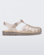 Side view of a glitter beige Possession sandal