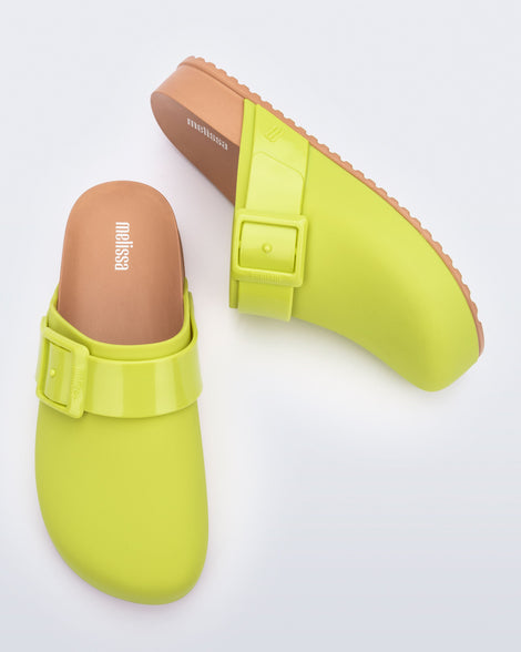 Top and side view of a pair of green with brown sole adult Cozy Clog.