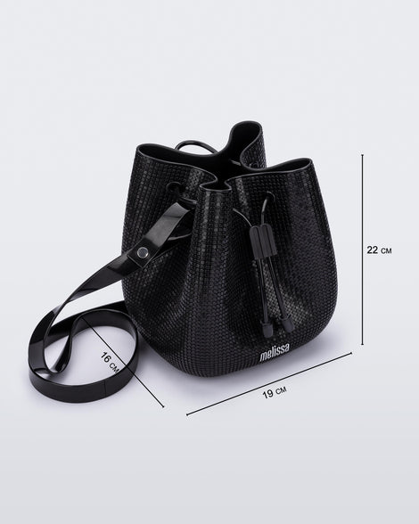 Angled view of a black Lux bucket bag with drawstring and strap with bag measurements of 19cm x 16cm x 22cm