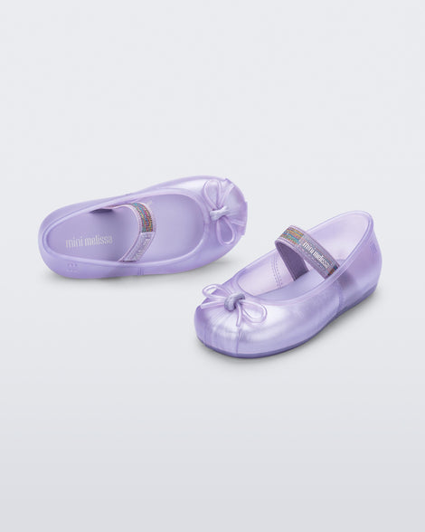 Angled view of a pair of lilac baby Sophie flats