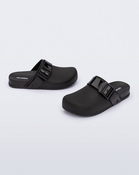 Angled view of a pair of black kids Cozy Clogs