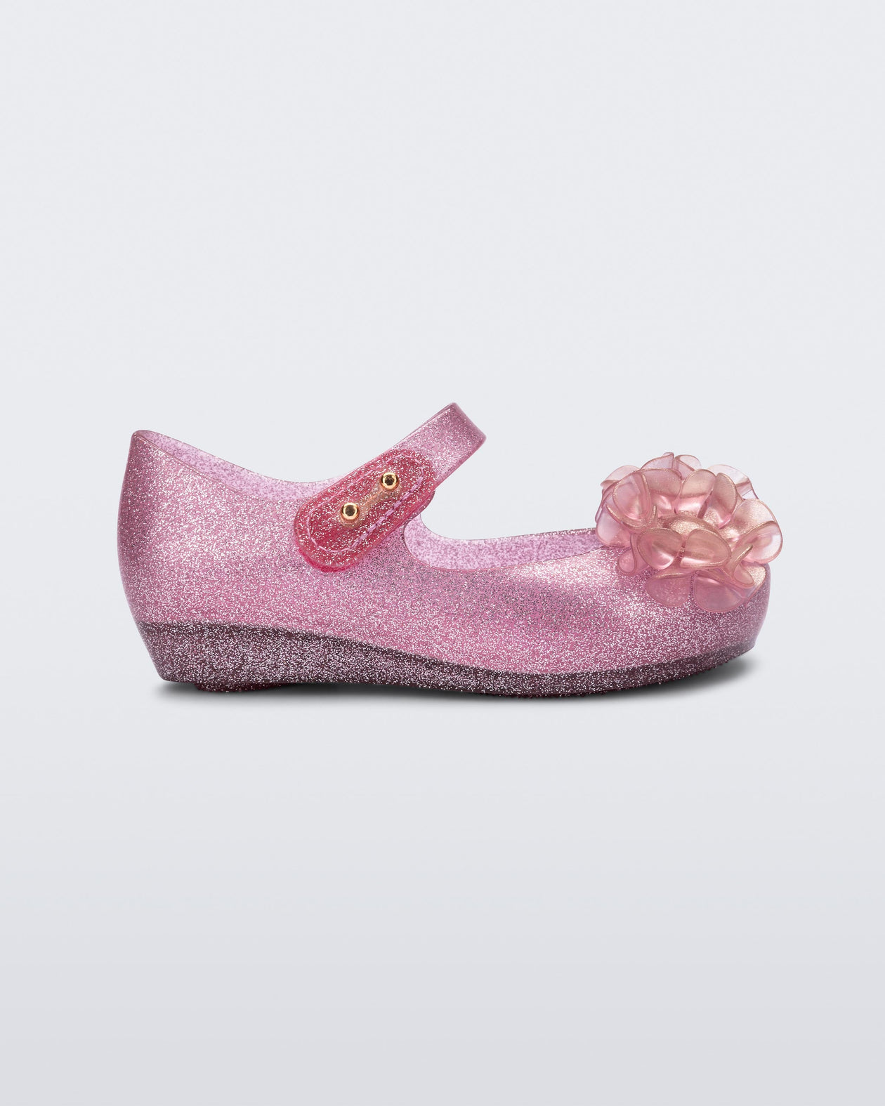 Side view of a glitter pink baby Ultragirl Springtime flats