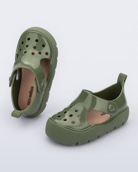 Top and angled view of a pair of green Bowie baby sandals.