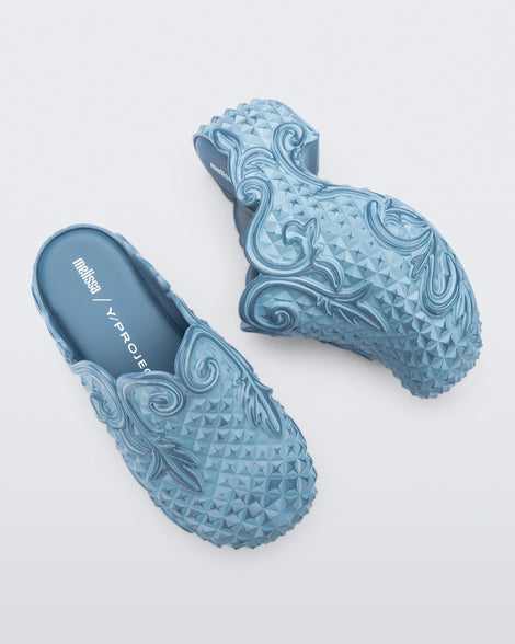 Top and side view of a pair of blue Court Clog + Y/Project platform clogs