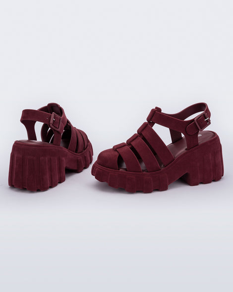 Back and side view of a pair of burgundy red Megan Velvet heel sandals.