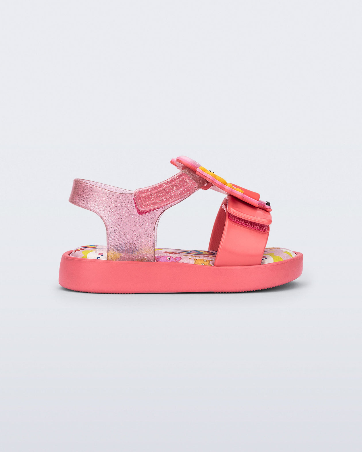 Side view of a green Jump + Peppa Pig baby sandal