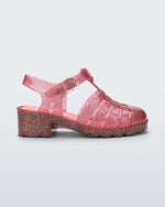 Side view of a glitter pink kids Possession Heel sandal