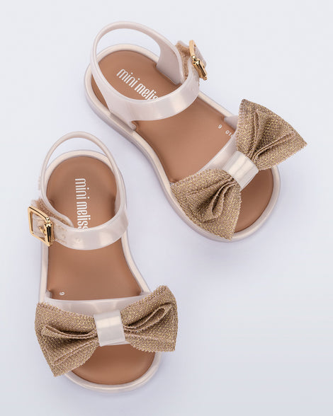 Top view of a pair of pearly beige Mar Sweet baby sandals