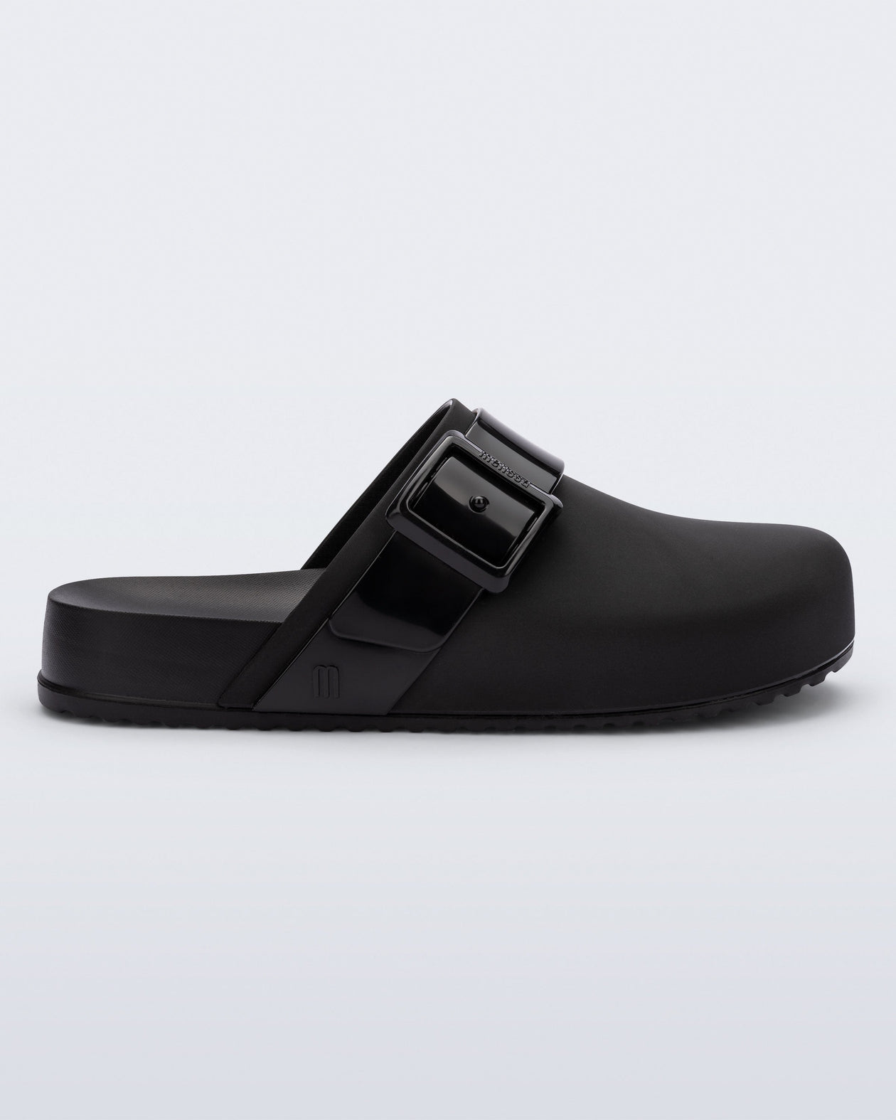 Side view of an adult black Cozy Clog.