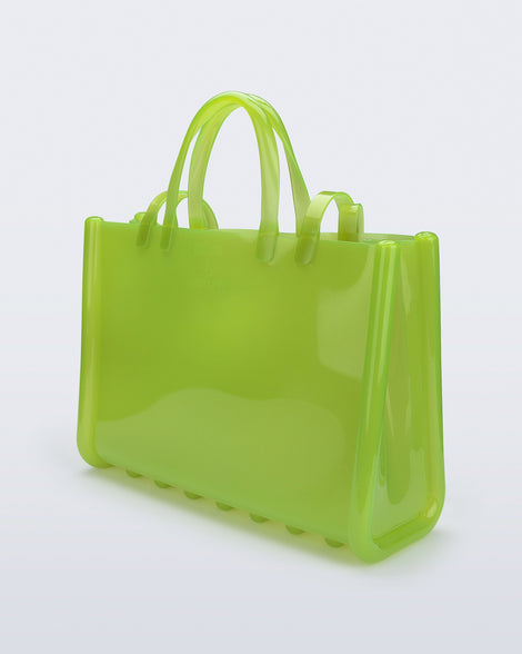 Back view of the green Large Jelly Shopper x Telfar bag