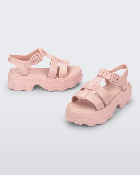 Angle view of a pair of light pink Ella platform adult sandals