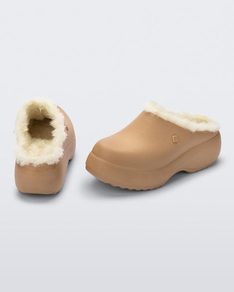 Back and side view of a pair of dark beige Free Clog Fluffy Platforms with light beige fluffy liner