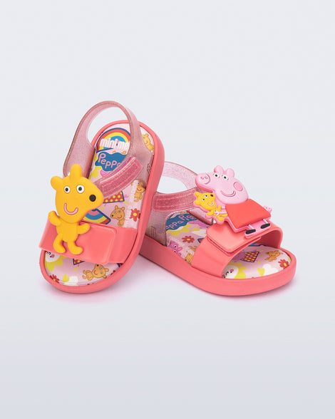 Angled view of a pair of green Jump + Peppa Pig baby sandals