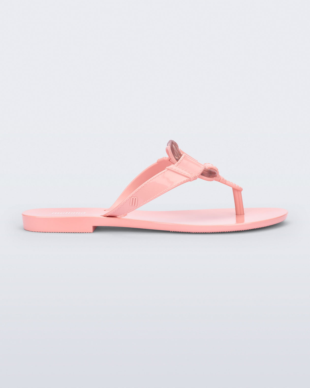 Side view of a pink Olivia adult flip flop