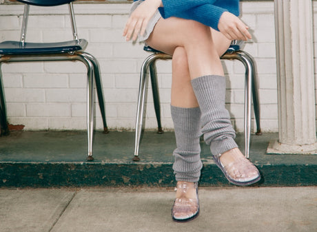 model wearing the clear possession sandals