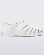 Side view of a white Melissa Possession sandal with several straps and a closed toe front.