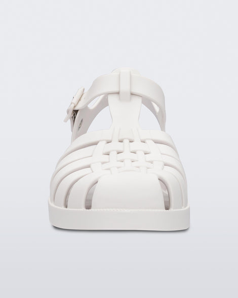 Front view of a white Melissa Possession sandal with several straps and a closed toe front.