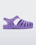 Side view of a lilac Mini Melissa Possession sandal with several straps and a lilac base.