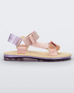 Side view of a yellow soled Melissa Papete sandals with pink and transparent purple straps.