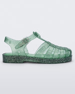 Side view of a Green/Glitter/Silver Mini Melissa Possession sandal with several straps and a green glitter base.